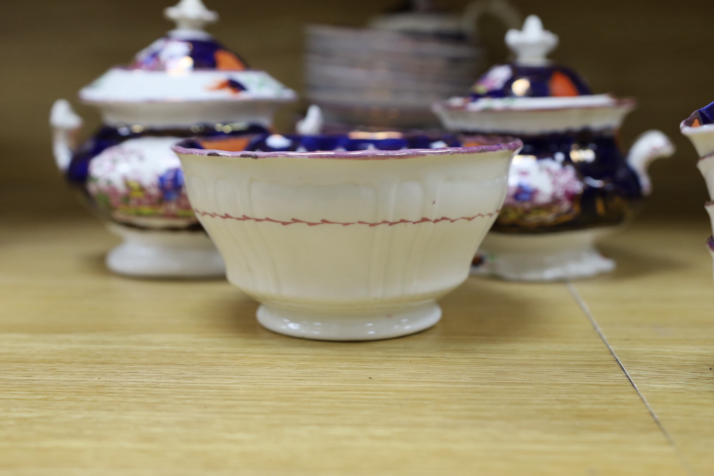 A quantity of Gaudy Welsh lustre tea wares with chinoiserie motifs